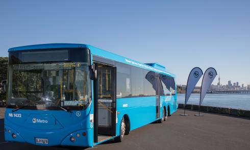 Bus parked by the ocean